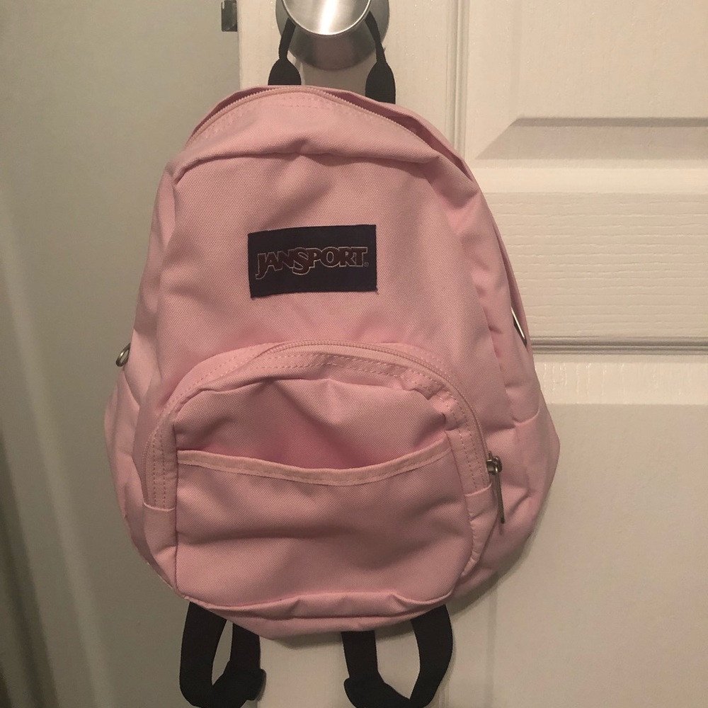 Pale pink mini Jansport backpack